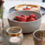 Mikasa Lipped Bowls, Set of 4 on the table with strawberries