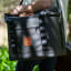 Kulgo Urban Cooler Black, 40L - Black carried by the sling