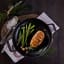 Victoria Enamelled Round Grill Cast Iron Skillet, 26cm with food on the table