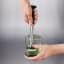 OXO Steel Muddler in a glass with mint