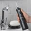 Waterpik Cordless Plus Water Flosser - Black showing scale