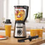 Bosch Series 4 VitaPower Blender, 1200W on the kitchen counter with fruits and a smoothy