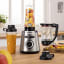 Bosch Series 4 VitaPower Blender, 1200W on the kitchen counter with fruits and a smoothy