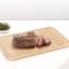 Brabantia Profile Wooden Chopping Board for Meat on the kitchen counter