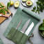 Arrow Leather Goods Classic Knife Roll Bag - Green on the table with knives