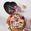 Le Creuset Non-Stick Heart Springform Cake Tin with a baked cake