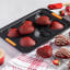 Le Creuset Non-Stick Tiered Heart Tray, 6 Cup with cookies