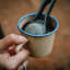 Brewspoon Filter Spoon Coffee Maker - Charcoal with an enamel mug