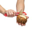 Dreamfarm Sharple Peeler - Red peeling a potato