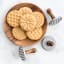 Nordic Ware Heirloom Cookie Stamps, Set of 3 on the table with cookies