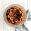Nordic Ware Magnolia Bundt Pan, 10-Cup on the table