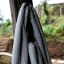 Ticket To The Moon Large Home Hammock - Frosty Grey packaged and hung on a wooden pillar