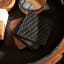La Porte Blanche Black Croc-Embossed Leather Coaster, Set of 4 on a serving tray with Turin Luxe Brown coasters