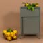 Popstrukt Bon Bon Buddy Side Table - Moss Grey with lemons in a waffle basket