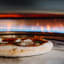Everdure by Heston Blumenthal Kiln S-Series 1 Burner Pizza Oven - Graphite with a pizza