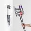 Dyson V8 Absolute Cordless Vacuum Cleaner mounted on the wall