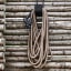 By Benson Deluxe Hose Set, 25m - Sand hanging on a wall