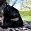 By Benson Deluxe Hose Set, 25m - Black bag on a bench