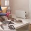 DeLonghi Slim Style Convector Heater, HSX2320 - White in the living room
