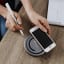 Canyon DS-7 Multiport Docking Station with Wireless Charger a phone being put on the product 