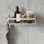 Umbra Flex Adhesive Shower Shelf - Grey in a bathroom setting