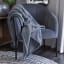 Linen House Teddy Throw - Steel on a chair