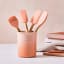 Le Creuset Peche Utensil Set, 5-Piece on the table