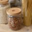 KitchenCraft Idilica Glass Storage Jar with Beechwood Lid - Small with almond nuts