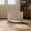 Mill WiFi Portable Heater, 1200W in the living room