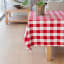 Linen House Revana Red Check Tablecloth on the table with a plant on the table