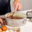 MasterClass Recycled Aluminium Springform Cake Tin, 20cm with cake dough