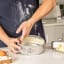 MasterClass Recycled Aluminium Springform Cake Tin, 20cm on the table with baking ingredients