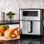 Russell Hobbs Super Nova Airfryer, 9L on the kitchen counter with food