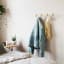 Umbra Dotsy 7 Hook - White & Natural In a Bedroom Setting 