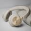 Bang & Olufsen Beoplay HX Headphones - Gold Tone on the table