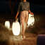 Kooduu Synergy Large Wine Cooler Lamp with a bottle of wine