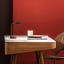 Kooduu Fokus Table Lamp - Anthracite on a desk