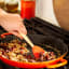 Le Creuset Signature Cast Iron Paella Pan, 34cm - Flame with food