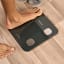 Taurus Digital Glass Bathroom Scale on the wooden floor