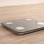 Taurus Digital Glass Bathroom Scale on the wooden floor