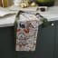 Ulster Weavers Cotton Blackthorn Apron on the kitchen counter