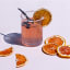 Schoonbee Landgoed Dried Cara Cara Mandarins Slices, 100g in a cocktail glass