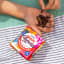 Schoonbee Landgoed Ridiculously Ruby Grape Chewies, Box of 4 on a picnic blanket 