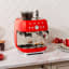 Smeg Retro Manual Espresso Coffee Machine with Grinder - Red on the kitchen counter