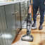 Bissell CrossWave HydroSteam Pet Multi-Surface Vacuum Cleaner - Black/Gold vacuuming spilt milk