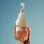 Gerard Bertrand Cote Des Roses Languedoc Rose, 750ml held in the air