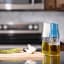 Zuutii Oil Dispenser, 500ml - Deep Blue on the table