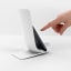 Blim Plus Stand Ladle Rest - Arctic White with a phone