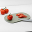 Blim Plus Skateboard Chopping Board - Forest Medium on the kitchen counter
