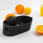 Blim Plus Oblo Juicer - Carbon Black on the table